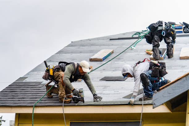 Professional Gutter Installation technician working in Camp Sherman, OR